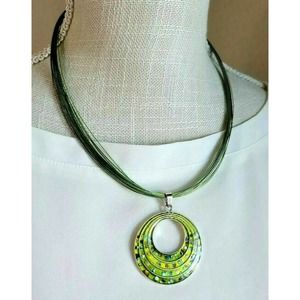 Multi Strand Green Wire Pendant with Glitter Enameled Disc